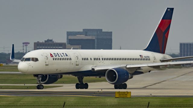 Boeing 757-200 (N669DN) - Holding short for departure on 13R