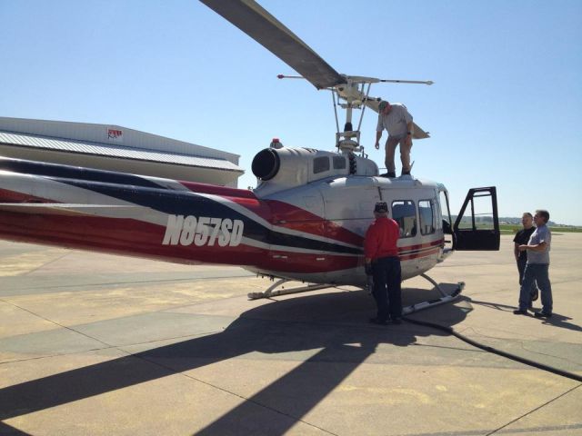 N857SD — - Paul Salmon with Dean Houseman and Chris Salmon.  Taking the Huey out for a stroll.