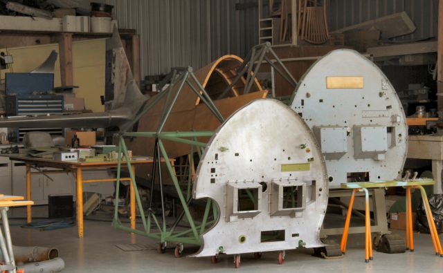 — — - Two CAC Boomerang fighters undergoing restoration at Caboolture