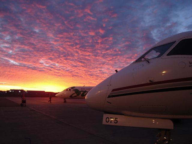 C-GXPS — - Corporate Express Airlines Saab 340A in foreground with Air Canada Jazz CRJ-200 behind on a spectacular morning at the Fort McMurray Airport, October 23rd, 2008.