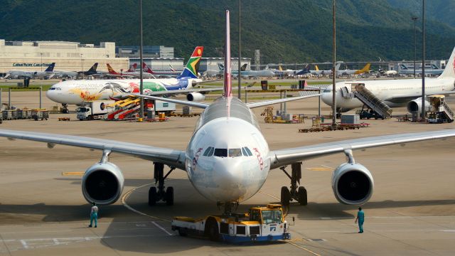 Airbus A330-300 (B-HYB) - The Spirit of Hong Kong pushing back from Gate 21