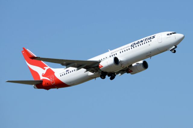 Boeing 737-800 (VH-VXJ) - Getting airborne off runway 23.  Monday 25th August 2014. 