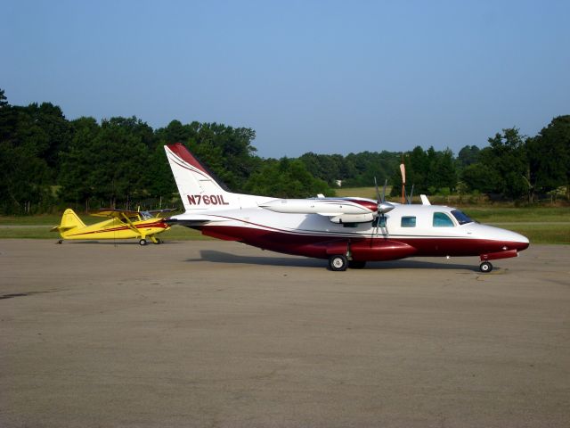 Mitsubishi MU-2 (N7601L) - Fox Stephens Field-Gilmer Municipal Airport (KJXI) Gilmer, TX   July 2008  Nice looking Stinson 108 too  Beautiful piney woods of East Texas!