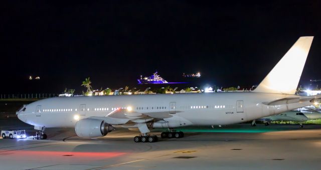 Boeing 777-200 (N777UK) - Private N777UK being push back before engine start up for flight at St Maarten.