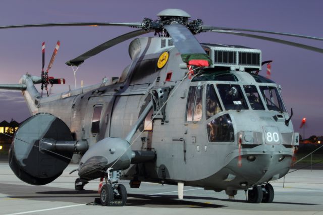 — — - Sikorski Sea King on static Display at Northolt. The large sensor on the starboard side, when deployed and operational is lowered down by the side of and below the helicopter and is used to detect and track enemy submarines.