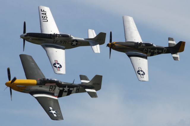 — — - WW II Warbird flypast at Duxford Air Museum.