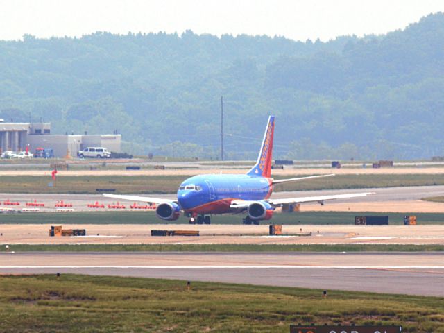 Boeing 737-500 (N521SW) - Holding Short 20C on 5/19/2013