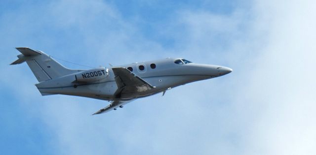 Beechcraft Premier 1 (N200ST) - Shortly after departure is this 2005 Beechcraft Premier 1 from the Summer of 2024.