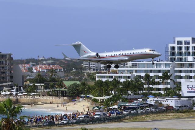 Bombardier Global 5000 (N505VJ) - N505VJ over maho beach