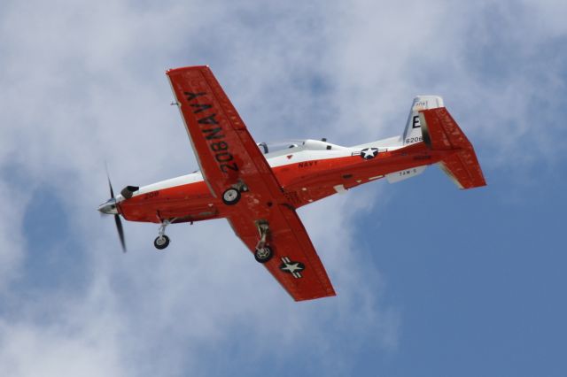 Raytheon Texan 2 (16-6208) - US Navy T-6 Texan II  (166208) from NAS Whiting Field flies over Sarasota-Bradenton International Airport