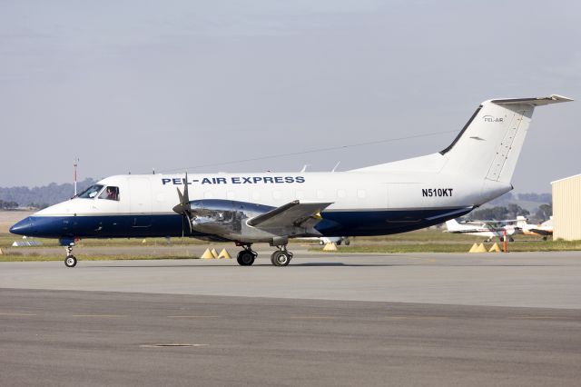 Embraer EMB-120 Brasilia (N510KT) - Embraer EMB-120ER Brasilia (N510KT) taxiing for the final time at Wagga Wagga Airport, heading for the USA.