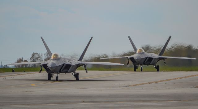 Lockheed F-22 Raptor — - Two F-22s from the 1st Fighter Wing taxiing out at LCK after a 6 day stay to avoid Hurricane Matthew