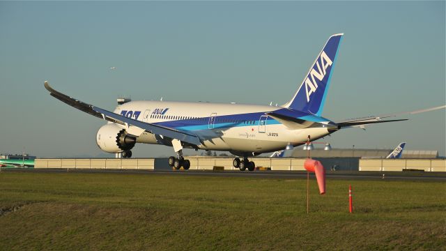 Boeing 787-8 (JA821A) - BOE514 nearing touchdown on Rwy 34L to complete a flight test on 9.11.13. (LN:107 cn 42245).