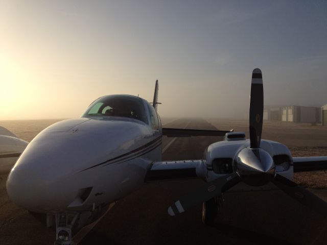 Beechcraft 55 Baron (N2053A) - Foggy Morning