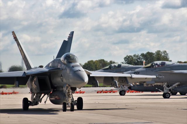 McDonnell Douglas FA-18 Hornet — - VFA-113 Strike Fighter Squadron "The Stingers" - Flight of 4 departing Green Bay to Naval Air Station Lemoore, CA.  Part of Carrier Air Wing 2