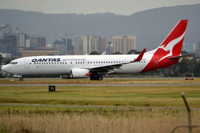 Boeing 737-800 (VH-VZY) - On taxi-way heading for Terminal 1, after landing on runway 23. Friday 5th October 2012.