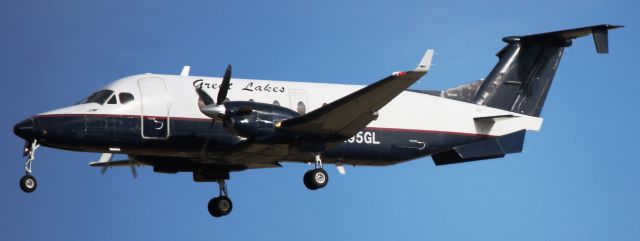 Beechcraft 1900 (N195GL) - Landing on 35L.