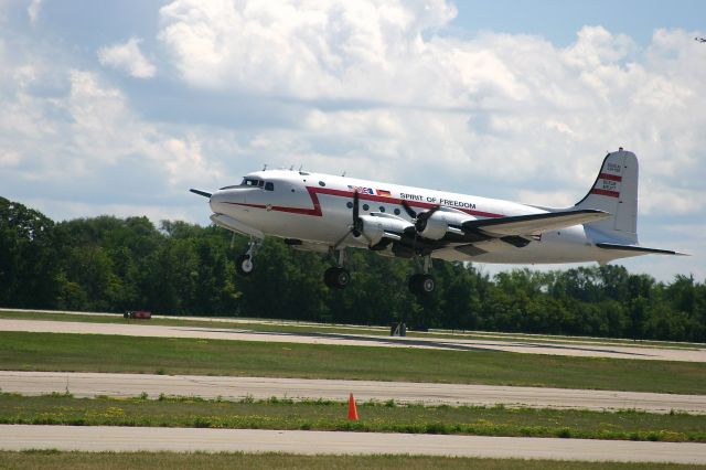 Douglas C-54 Skymaster (N500EJ) - DC-4  taking off at the EAA Fly In