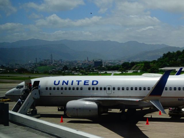 Boeing 737-700 — - A United 737 sits at the gate in Tegucigalpa, Honduras.