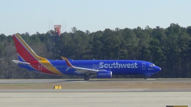 Boeing 737-800 (N8642E) - Hart One" departing as Southwest 214 to Baltimore.