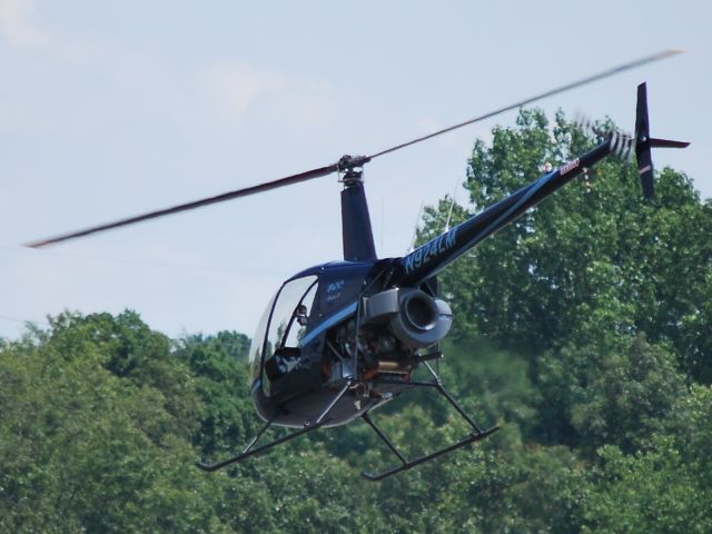 Robinson R-22 (N924LM) - Departing to the NE - 7/22/09