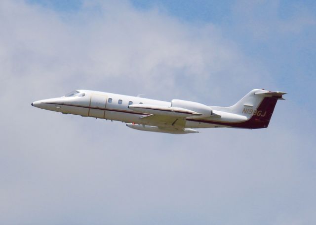 Learjet 35 (N198GJ) - At Shreveport Regional. Taking off.