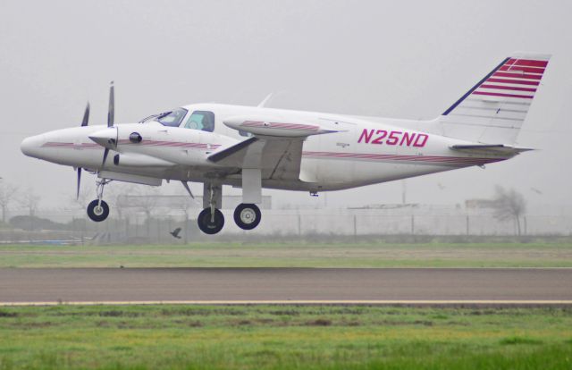 Piper Cheyenne 2 — - Photo of Piper Cheyenne 2 (N25ND)departs Merced Regional Airport, runway one-two