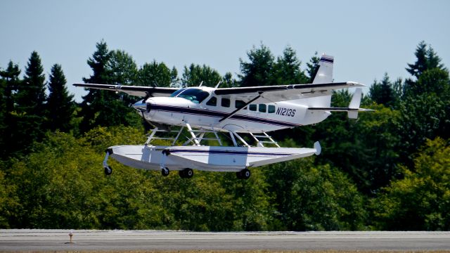 Cessna Caravan (N1213S) - A Cessna Caravan float plane on final to Rwy 34L on 7.25.17. (Ser #20800243).