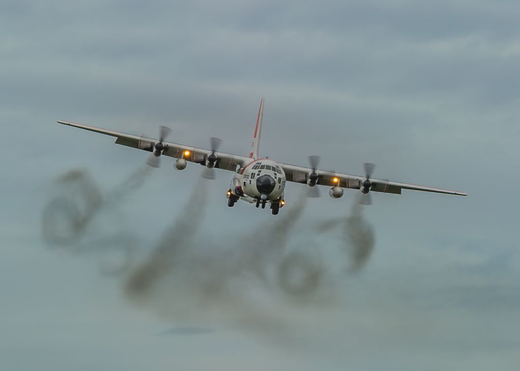 Lockheed C-130 Hercules (C1712) - Smoking the Groove<br>A US Coast Guard HC130R from Kodiak rolls into the groove at Kenai Municipal Airport, Alaska while conducting multiple approaches to the runway. The winds were gusting and swirling inconsistently, as seen by the smoke. ©Bo Ryan Photography | a rel=nofollow href=http://www.facebook.com/BoRyanPhotowww.facebook.com/BoRyanPhoto/a Please vote if you like the image!