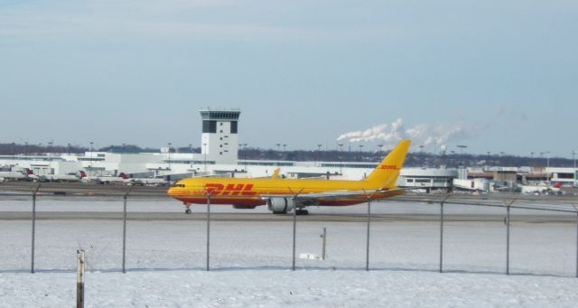 BOEING 767-300 — - DHL 767-300 landing at KCVG on runway 18L\36R (landing on 18), Kicking up snow as the engines reverse to slow down the heavy behemoth.br /br /Feels good to see a mighty plane land on runway 18L after it has been closed for a year and a half for a total runway redo. br /br /Taken on 01/04/2014