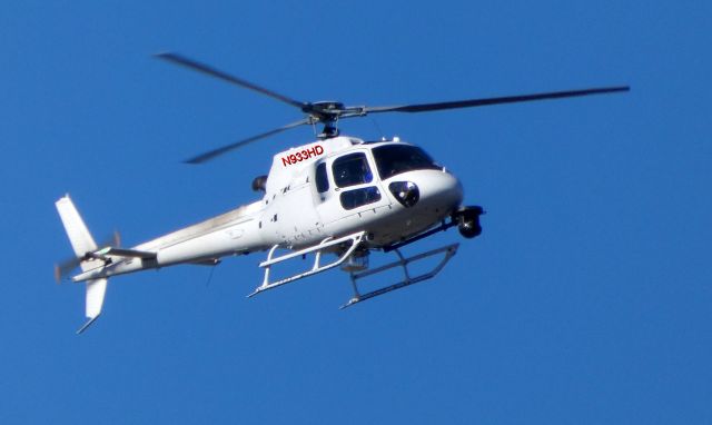 Eurocopter AS-350 AStar (N933HD) - Hovering above the house is this 2013 Eurocopter AS-350 in the Spring of 2019.  Rotorcraft is used by the local CBS TV affiliate.