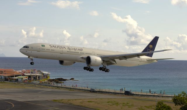 BOEING 777-300ER (HZ-AK44) - Royal Saudi airlines Boeing777-300ER over maho beach St Maarten moments before touch down!!