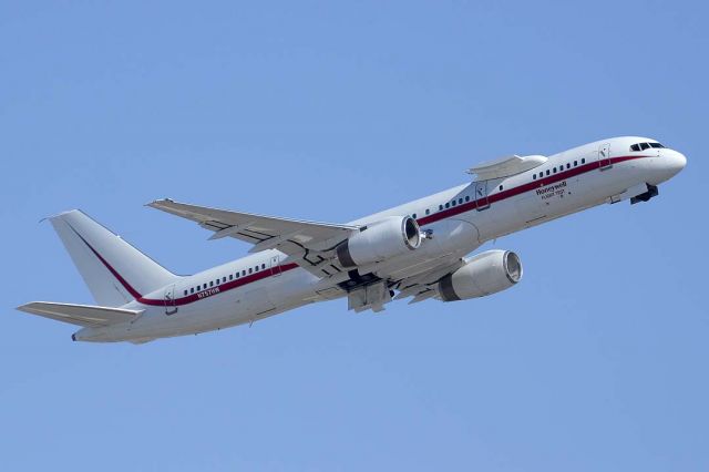 Boeing 757-200 (N757HW) - Honeywell's Boeing 757 Engine Testbed N757HW deapreted from Phoenix Sky Harbor for Fort Lauderdale, Florida at 9:16 in the morning on August 9, 2013. It had no engine mounted on the test pylon.