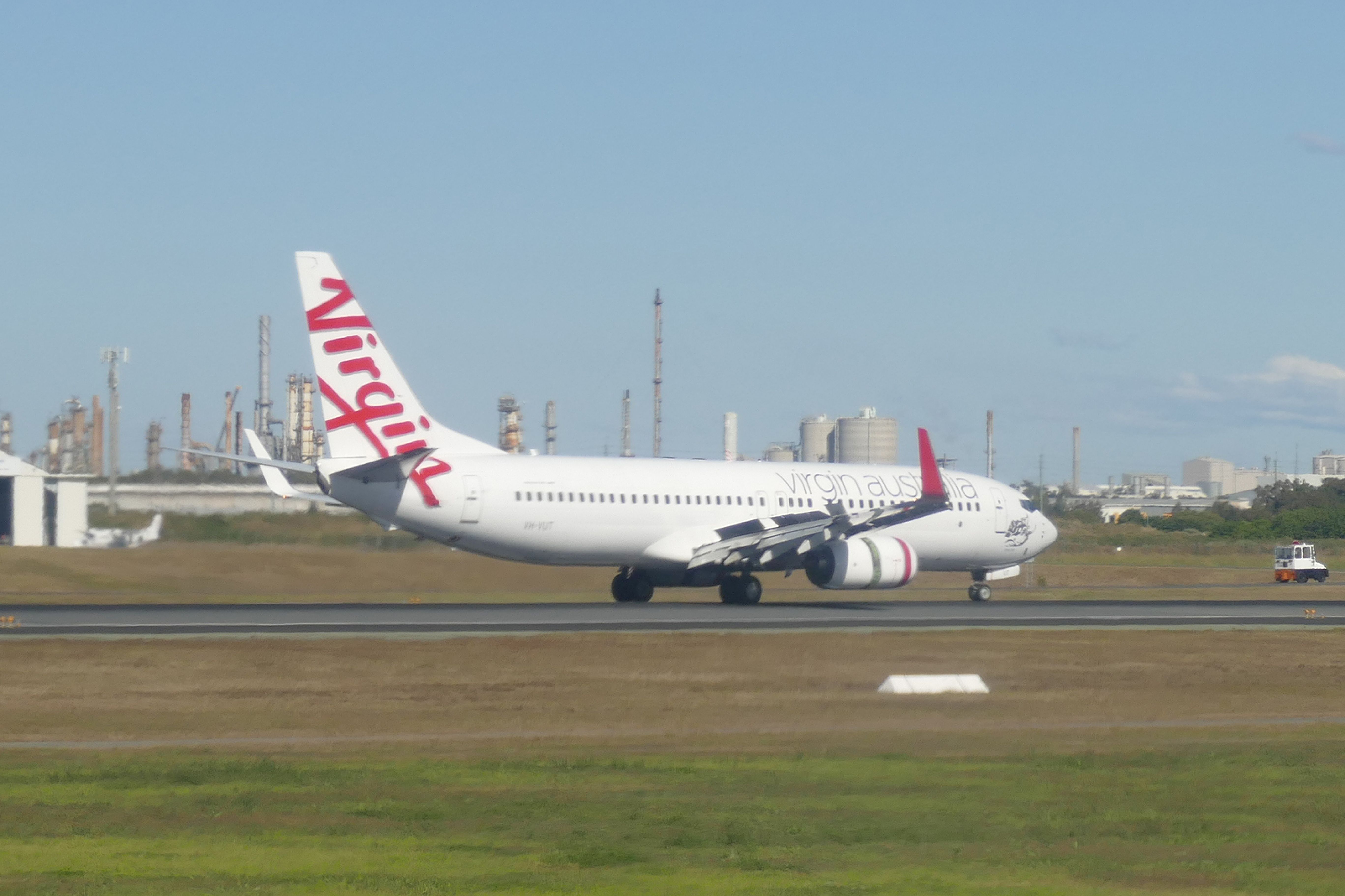 Boeing 737-800 (VH-VUT) - 6th August 2015: Virgins Boeing 738 just after touch-down at Brisbane airport.