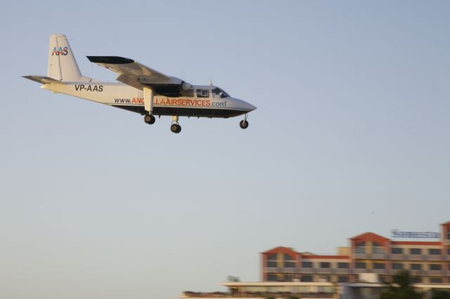 ROMAERO Islander (VP-AAS) - Late afternoon Sun reflects on the Starboard side of this Britten-Norman Islander coming into Sint Maarten..