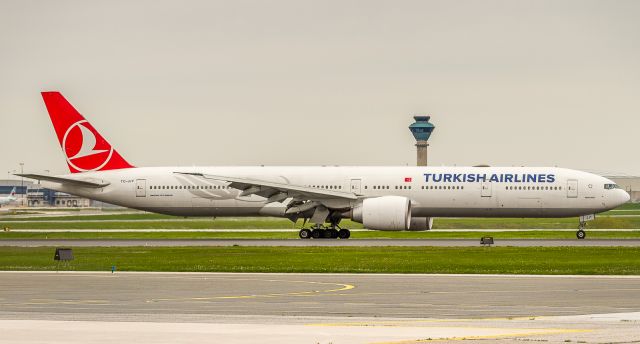 BOEING 777-300ER (TC-JJY) - Rolling out on runway 23 as TK17 direct from Istanbul