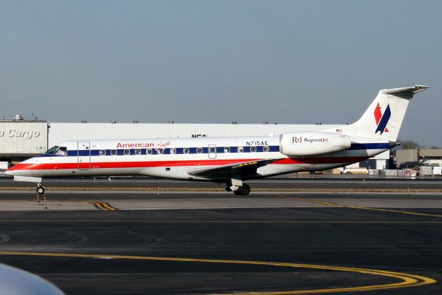 Embraer ERJ-135 (N715AE) - Taxiing to Terminal 8 on 13-Oct-06.  With American Eagle from May-00 to Aug-13 when it became N403RW for RVR Aviation Charter.