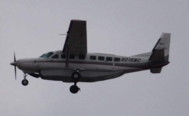 Cessna Caravan (N215MC) - I was out like usual up at the University of Alaska Fairbanks and the airplanes at Fairbanks International Airport were flying out from the south. This was a flight serving between Fairbanks and Beaver both in Alaska.