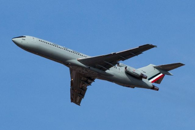 BOEING 727-200 (FAM3506) - 4/1/12:  Fuerza Aerea Mexicana (Mexican Air Force) B727-200 FAM3506 climbing out over Miami Lakes enroute to Mexico City after takeoff from runway 27-R at Opa-locka Executive Airport.