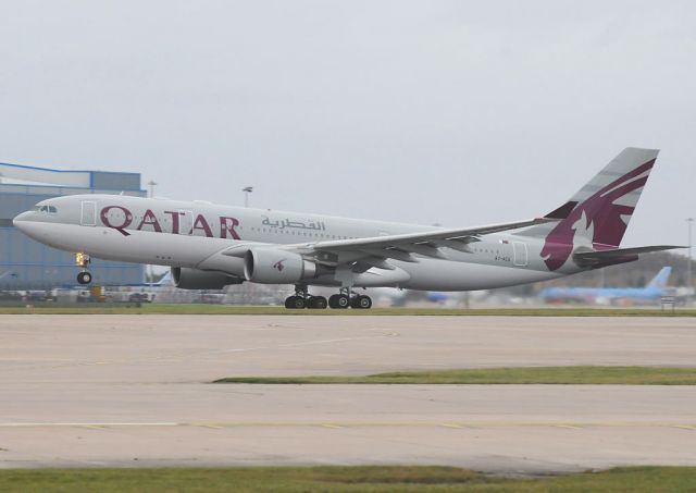 Airbus A330 (A7-ACG) - QATAR A330 lifts  into the gloom from RW23R, bound for sunnier climes.