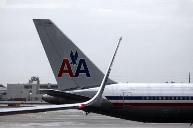 BOEING 767-300 (N384AA) - Taxiing for take off to KORD .. With winglet of N365AA -- 02-16-2013