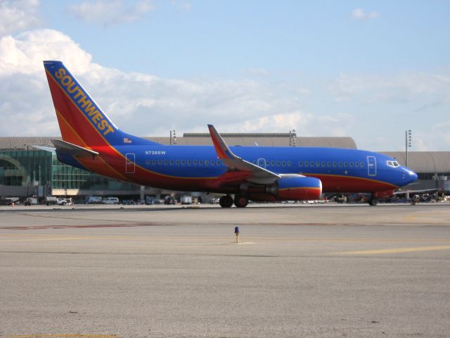 Boeing 737-700 (N726SW) - Holding on RWY 19R