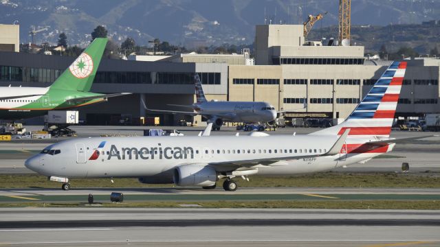 Boeing 737-800 (N316PF) - Taxiing to gate at LAX after landing on 25L