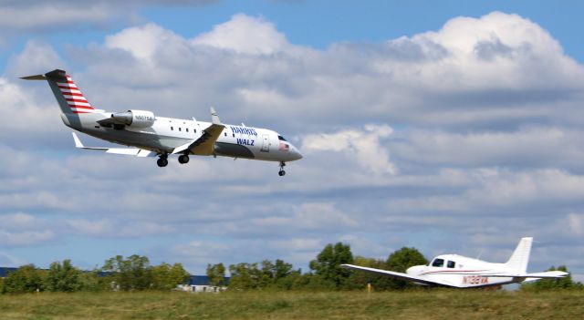 Canadair Regional Jet CRJ-200 (N907SA) - While the Piper holds, a Tri-State Charter 2004 Mitisubishi Canadair Regional Jet 200ER is about to touch down in September 2024.