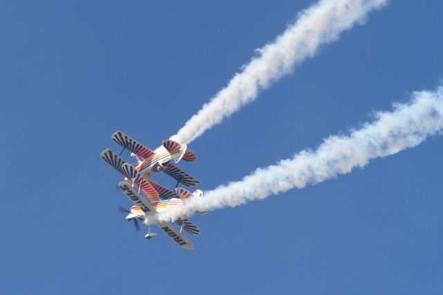 AVIAT Eagle (N362ET) - The Iron Eagles, displaying Christen Eagle II aircraft, don't just look close during Airventure 2012 - they are close, very close...