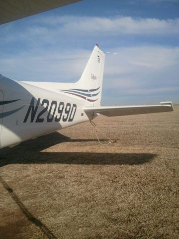 Cessna Skyhawk (N2099D) - Under the left wing, about to depart for an instructional flight to Guthrie (GOK).