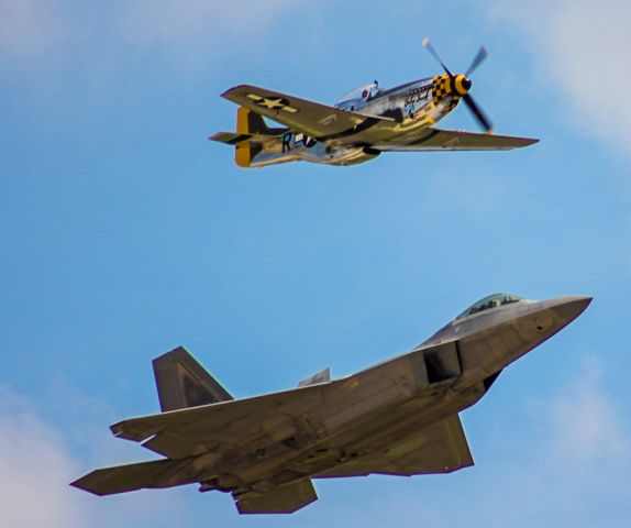 Lockheed F-22 Raptor — - F-22 and P-51 doing Heritage Flight at Rockford Airfest 2015 