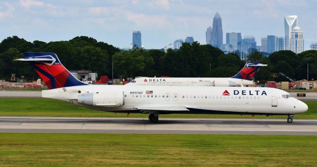 Boeing 717-200 (N997AT) - Double Dogs! A couple of angry puppies at CLT, 6/8/19.