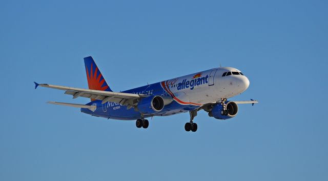 Airbus A320 (N218NV) - Make-A-Wish landing on runway 18 in Fargo, ND (2/19/15)