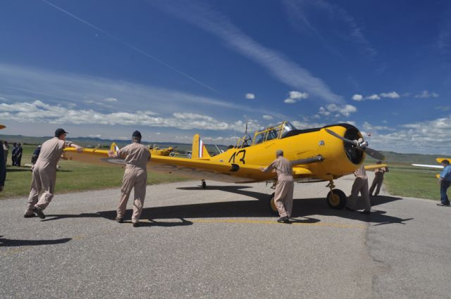 North American T-6 Texan (C-FROA) - Harvard Mk. IV (CF-ROA) The "High Flight" Harvard restored in the markings originally flown by John Gillespie Magee RCAF at No. 2 STFS Uplands Ottawa ON Canada by Vintage Wings of Canada Yellow Wings Tour Claresholm Alberta July 10, 2011